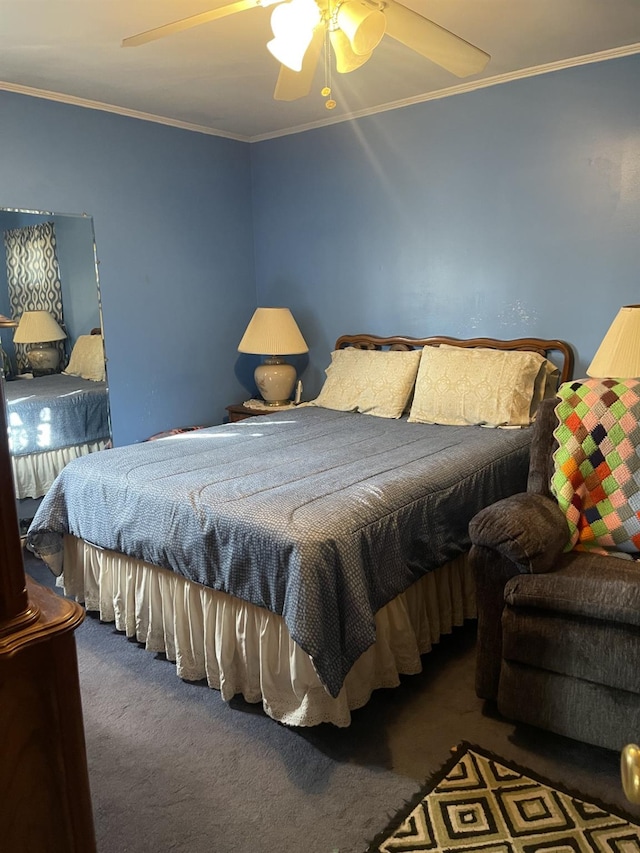 bedroom featuring dark carpet, ornamental molding, and ceiling fan