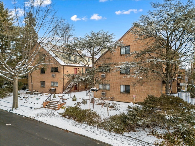 view of snow covered property