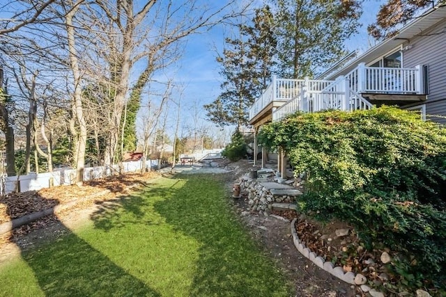 view of yard with a deck