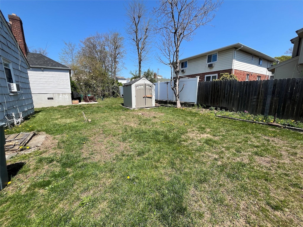 42 Firwood Rd, Port Washington, NY 11050 - view of yard with a storage unit and cooling unit