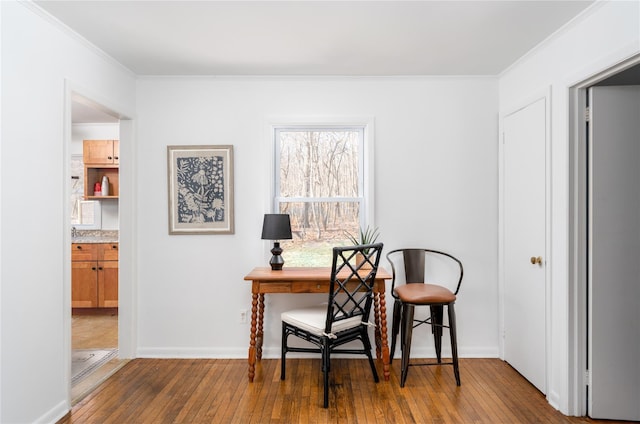 office featuring crown molding and dark hardwood / wood-style flooring