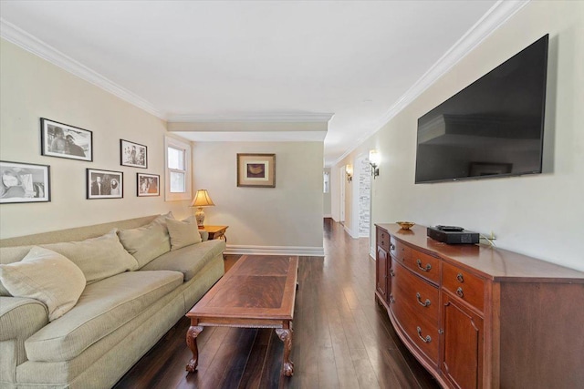 living room featuring dark wood-style floors, baseboards, and ornamental molding