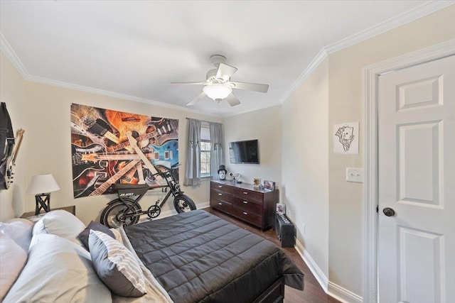 bedroom with dark wood finished floors, crown molding, baseboards, and ceiling fan