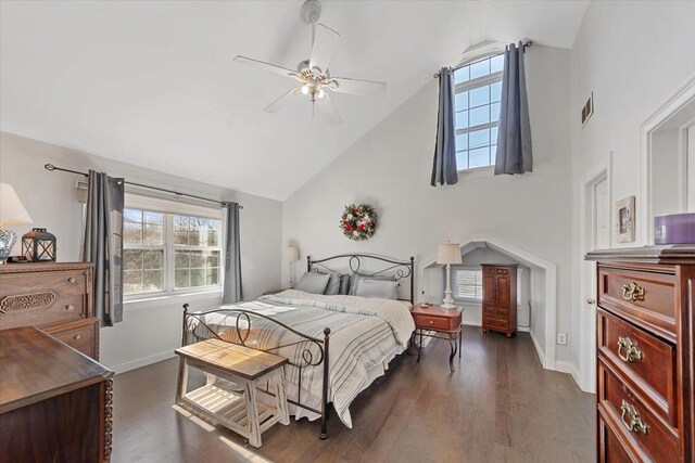 bedroom featuring high vaulted ceiling, visible vents, a ceiling fan, baseboards, and dark wood-style floors