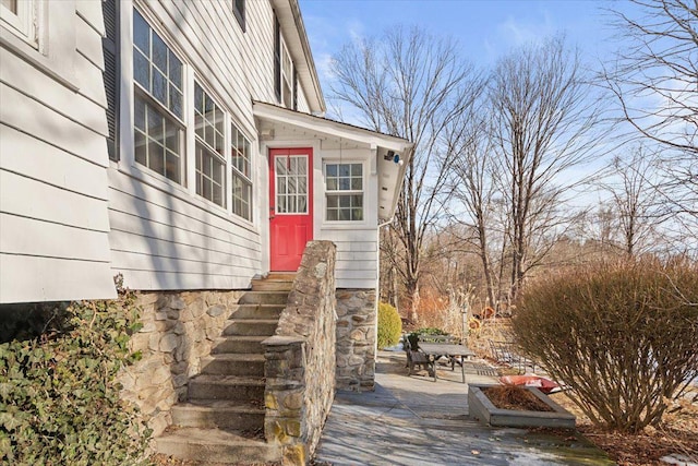 doorway to property featuring a patio