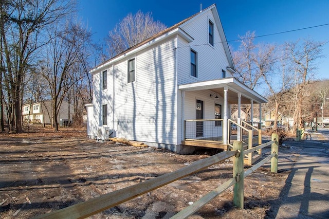 view of home's exterior with a porch