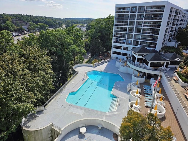 view of swimming pool with a patio area