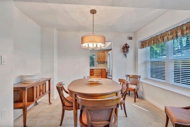 view of carpeted dining room