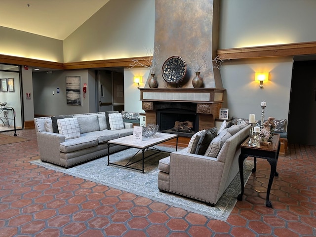 tiled living room with high vaulted ceiling