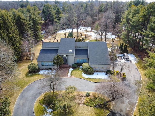 drone / aerial view with a view of trees