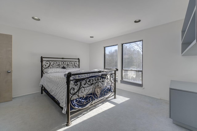 bedroom with light colored carpet