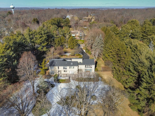 aerial view featuring a view of trees