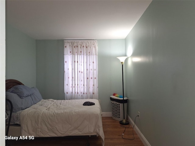 bedroom featuring wood-type flooring