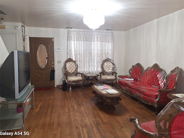 living room with dark hardwood / wood-style floors