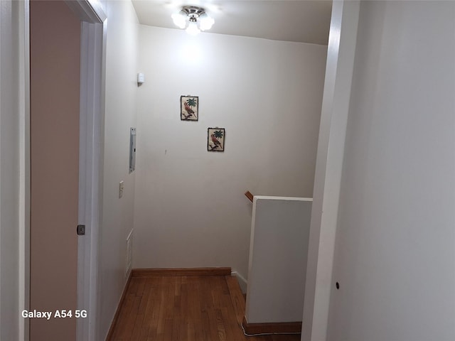 corridor featuring hardwood / wood-style flooring