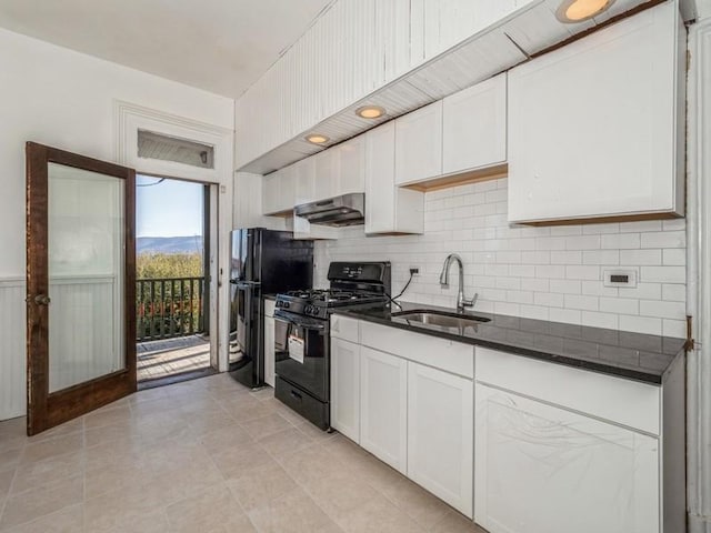 kitchen with white cabinets, sink, and black appliances