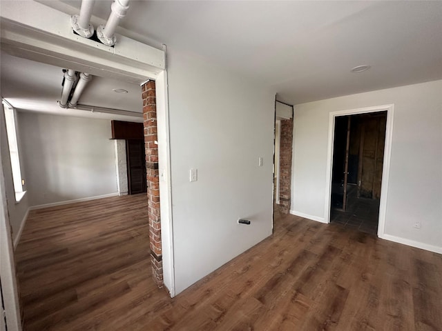 interior space with dark hardwood / wood-style floors