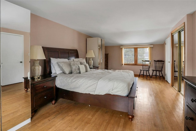 bedroom with light wood-type flooring