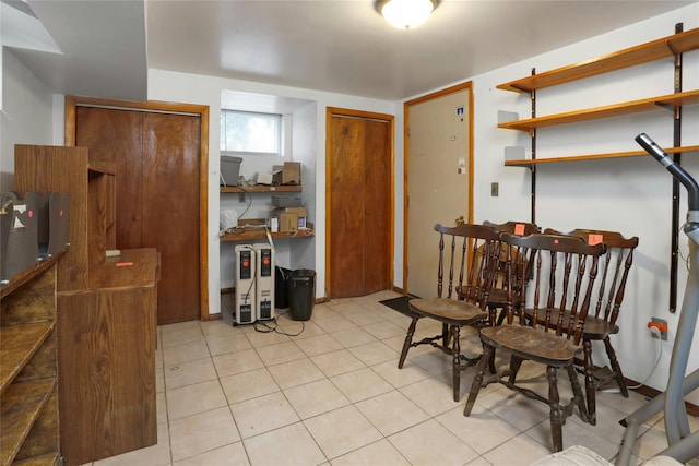 living area with light tile patterned floors