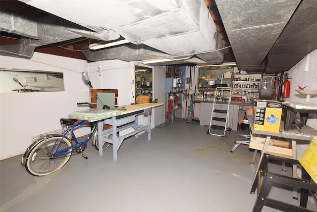 basement with a workshop area