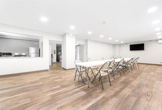 dining room with light hardwood / wood-style flooring