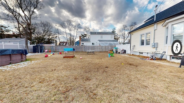 view of yard featuring a pool