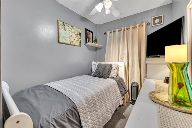 bedroom with ceiling fan and carpet flooring