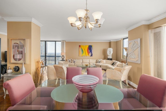 dining room with an inviting chandelier and crown molding