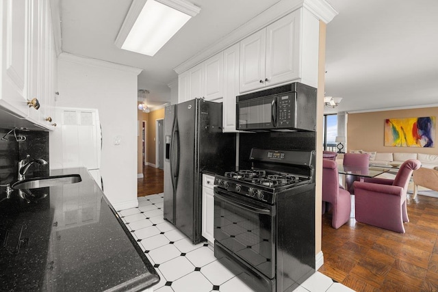 kitchen with white cabinetry, sink, crown molding, and black appliances