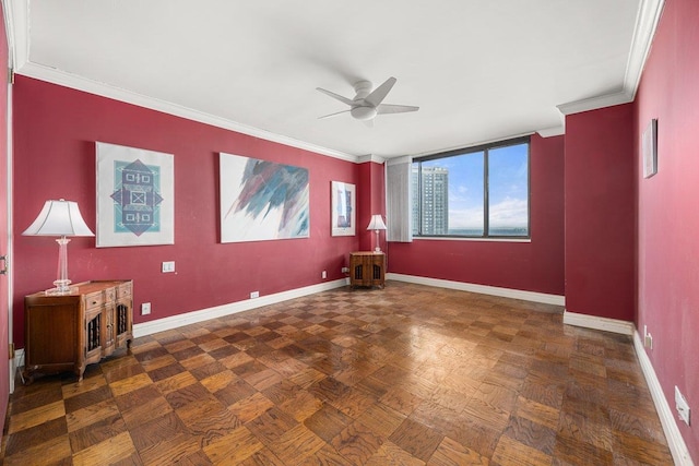 unfurnished room with crown molding, ceiling fan, and dark parquet floors