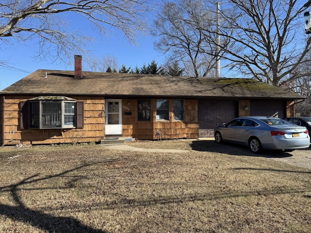 single story home featuring a garage