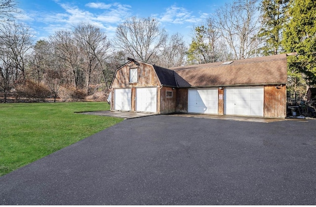 garage with a yard