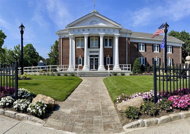 view of front of home with a front yard