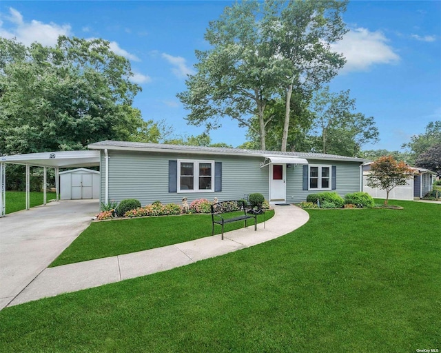 view of front facade featuring a carport, a front lawn, and a shed