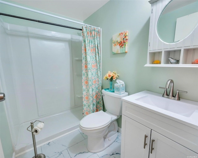 bathroom with vanity, toilet, and a shower with shower curtain