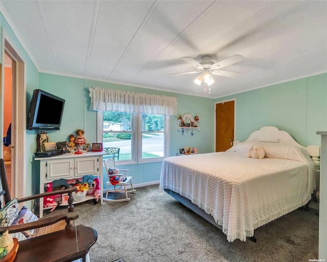 bedroom with ornamental molding, ceiling fan, and carpet