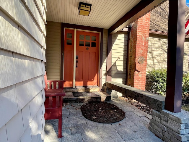 entrance to property featuring a porch