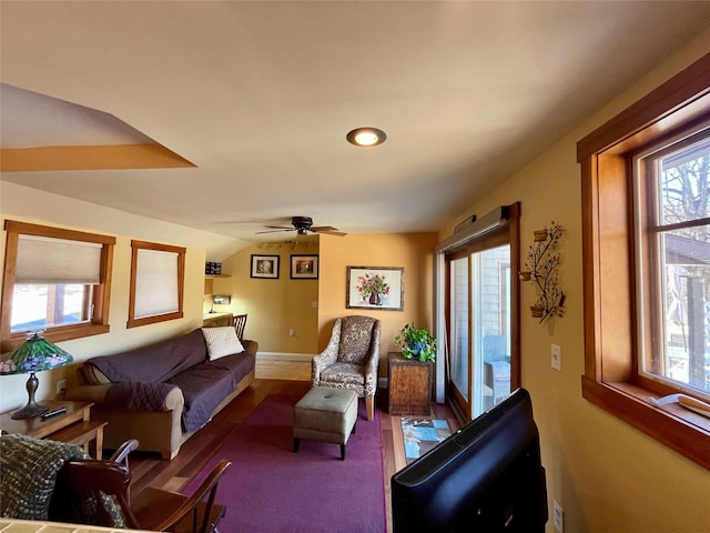 living room featuring ceiling fan