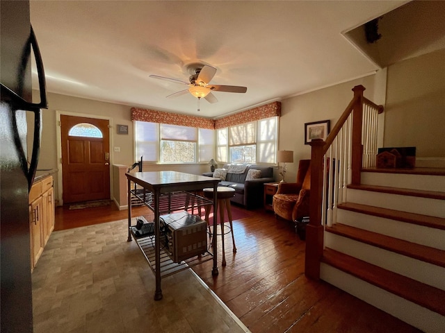 dining area featuring hardwood / wood-style flooring and ceiling fan