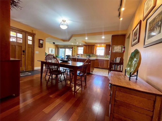 dining room with dark hardwood / wood-style floors