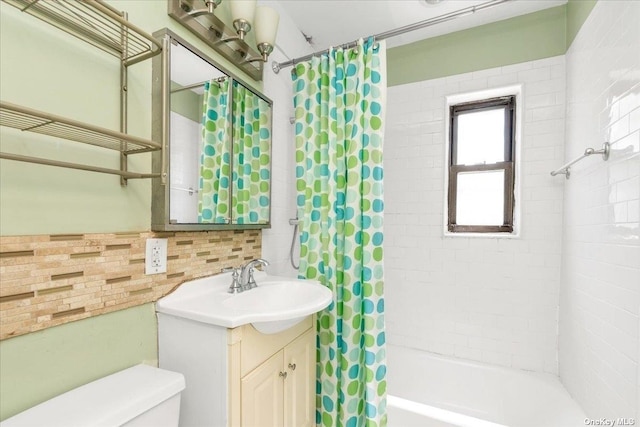 full bathroom featuring vanity, shower / tub combo, backsplash, and toilet