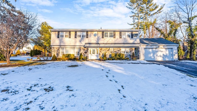 view of front of property with a garage