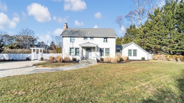 colonial home with a front yard