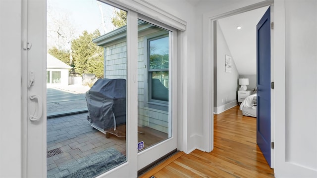 doorway to outside featuring hardwood / wood-style floors