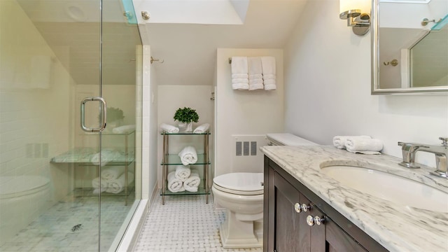 bathroom with walk in shower, toilet, vaulted ceiling, vanity, and radiator heating unit