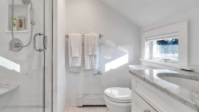 bathroom with lofted ceiling, baseboard heating, vanity, toilet, and walk in shower