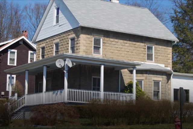 view of front of home featuring covered porch