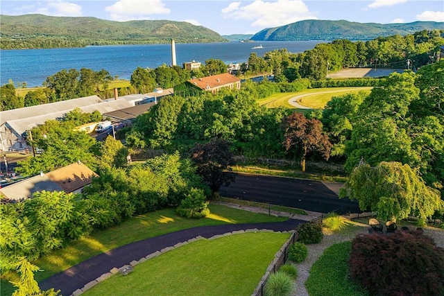 birds eye view of property featuring a water and mountain view