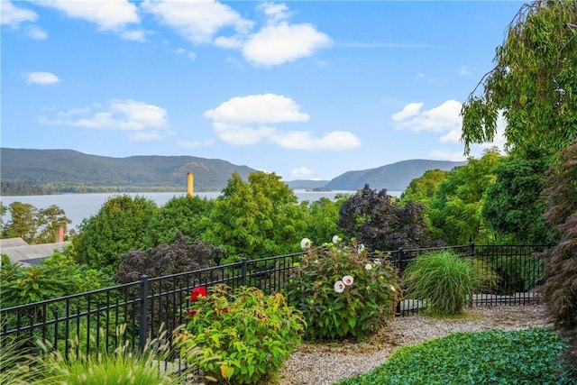 property view of mountains featuring a water view