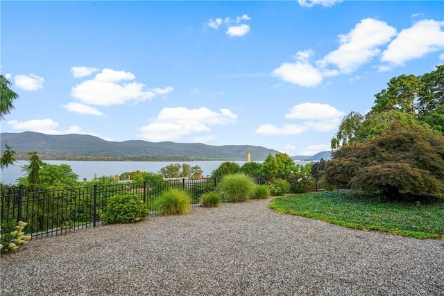 view of mountain feature with a water view